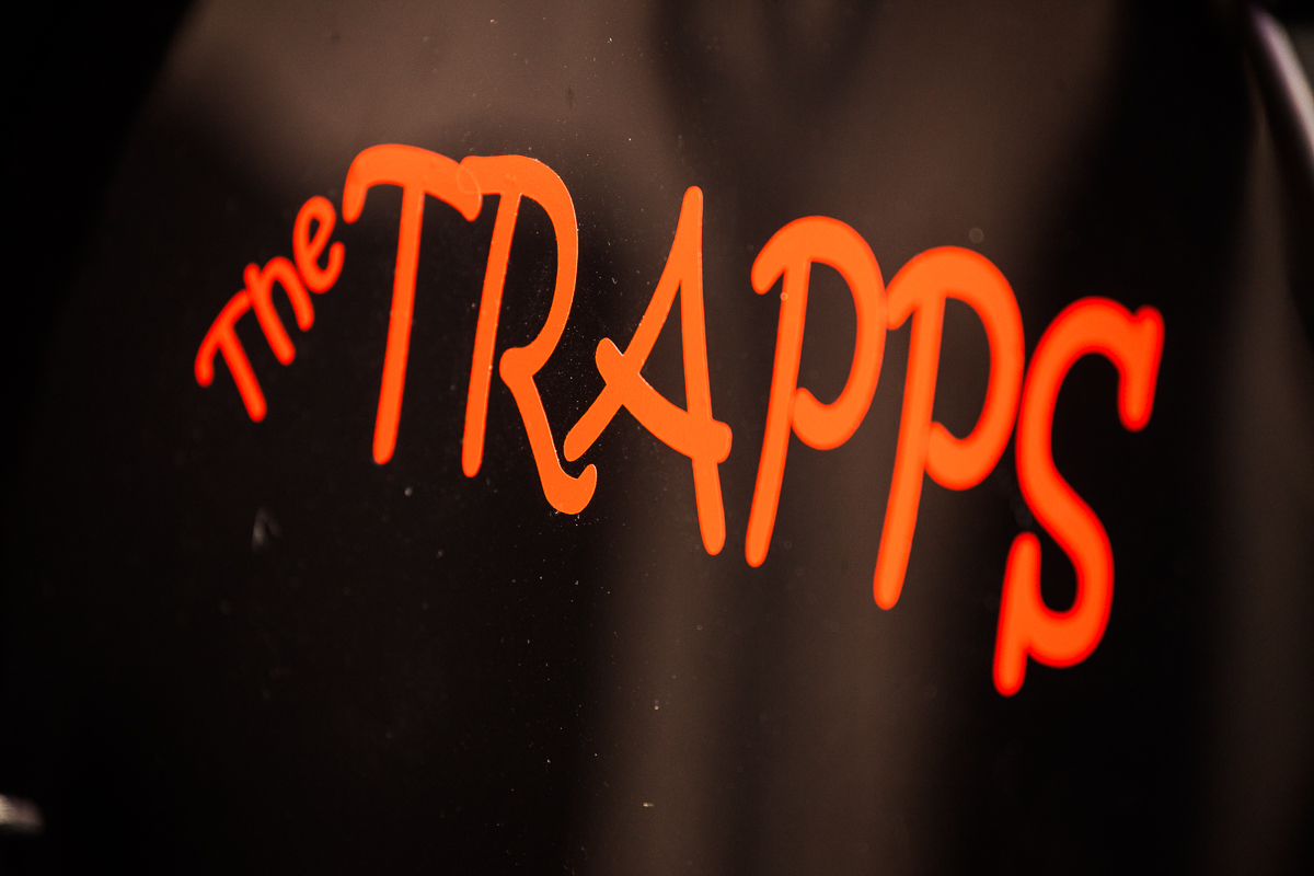 A close up of the word " trapps ".